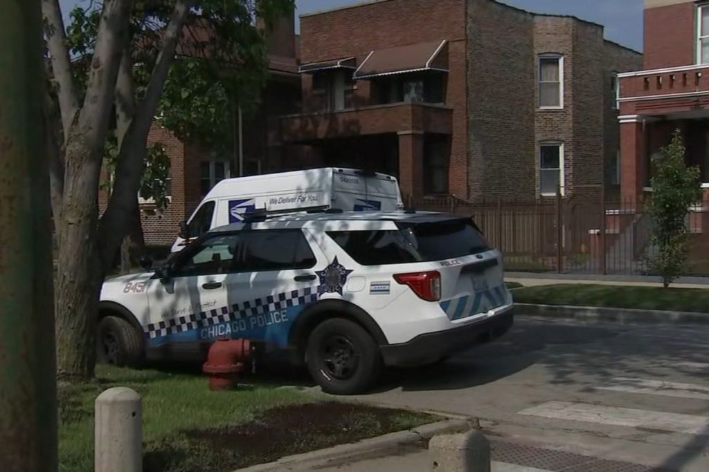 Postal worker robbed at gunpoint in Englewood; police searching for 4 suspects