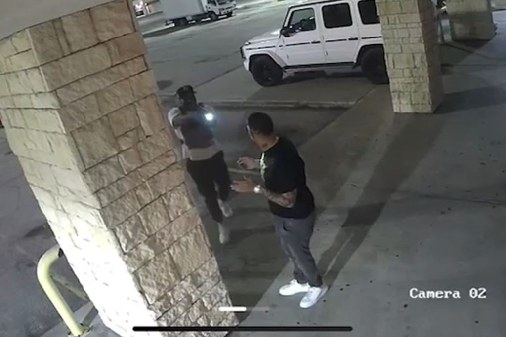 Houston store owner shoots robbery suspect who posed as police, video shows