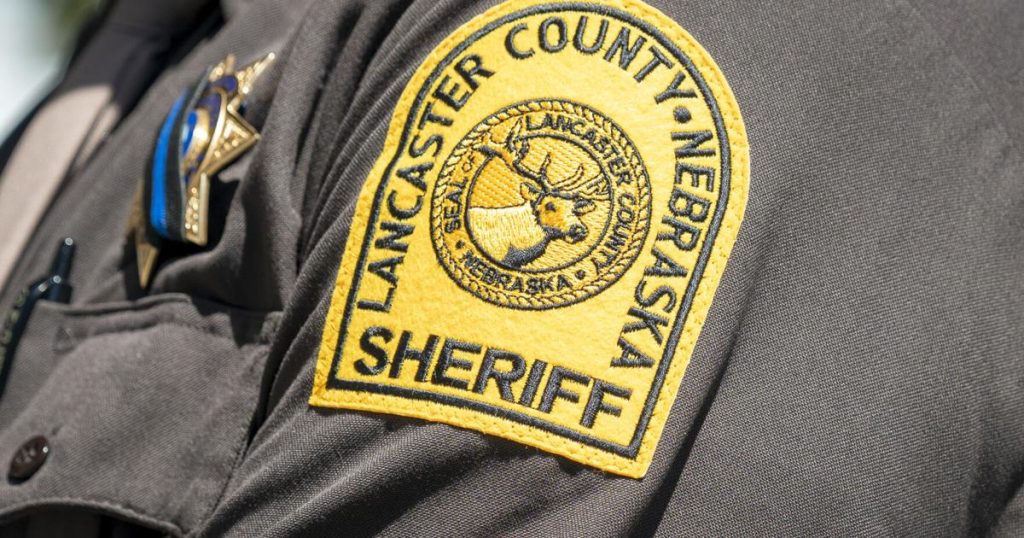 Duo left alone in squad car during drug stop escapes; shoeless suspect still at-large