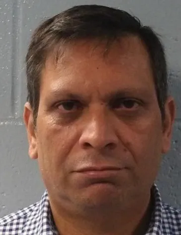 DOCS: Oklahoma State University staff member arrested for allegedly soliciting minors online