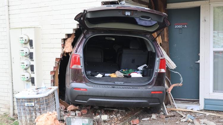 No injuries after driver crashes car into north Indianapolis apartment building