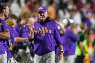 LSU athletic director resigns in wake of football coach firing