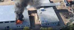 Fire burns on roof of city’s under-construction utilities building