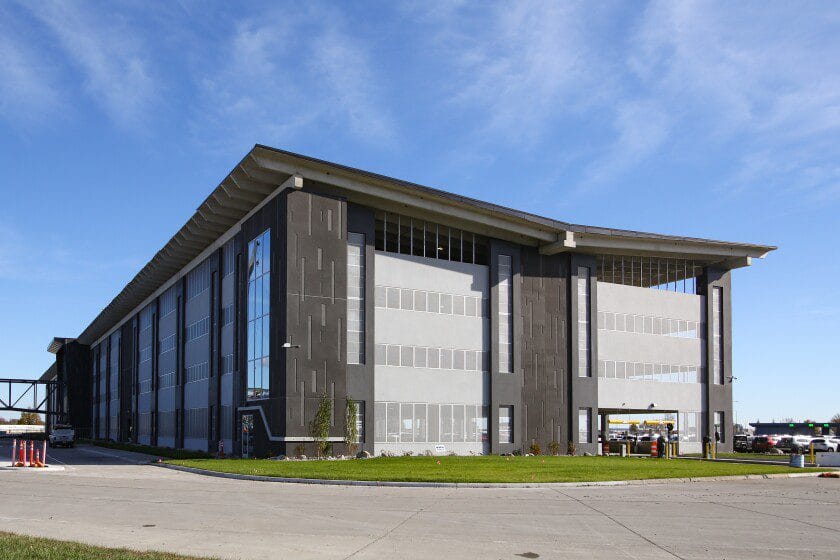 Winds partially rip rubber membrane off parking ramp roof at Fargo airport