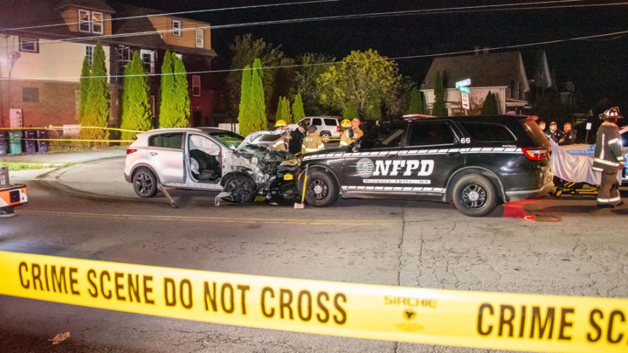 Two 14-year-olds hurt after rolling over stolen car into police car