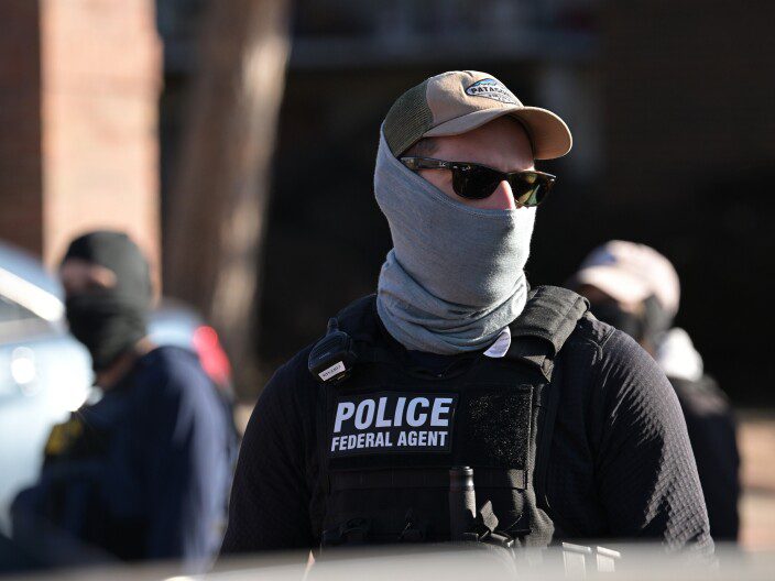 Fullerton police say ICE agent pulled gun on woman recording him in Santa Ana