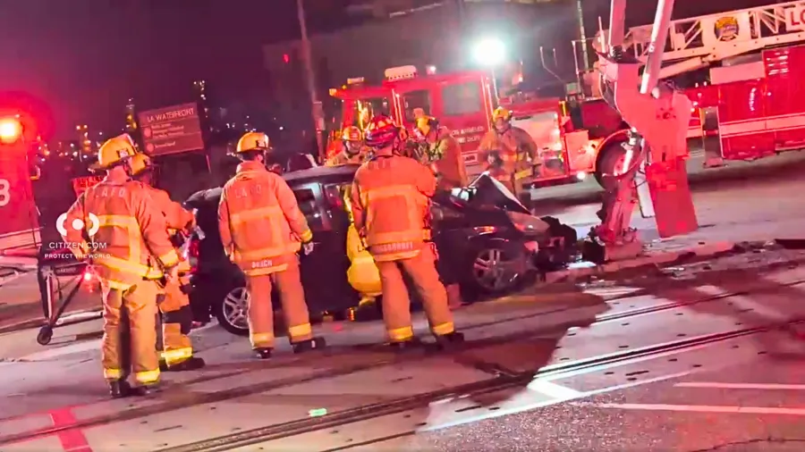 Driver trapped, 2 hospitalized after crashing into Los Angeles train-crossing signal