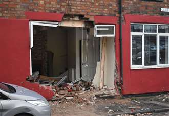 Photos reveal extent of damage after car collided with house