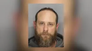 Man accused of setting Cobb dwelling on fire while victim inside