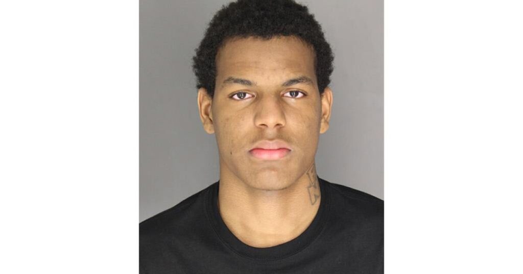 Man wanted in homicide at unauthorized barbershop at Detroit school, source says