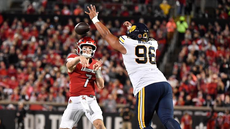 Texas man indicted for terroristic threats against college football quarterback, head coach and his family.