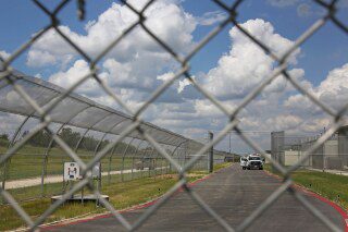 Feds expand terrorism charges in shooting at Texas detention center