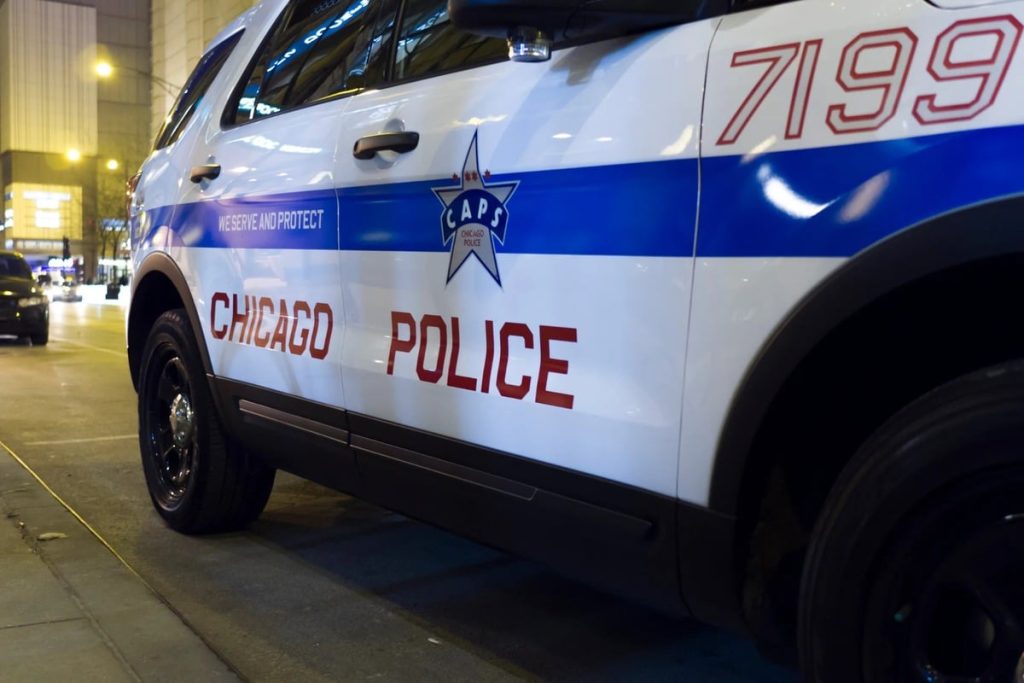 Man Arrested After Bullet from Apartment Below Grazes Resident in Portage Park, Chicago
