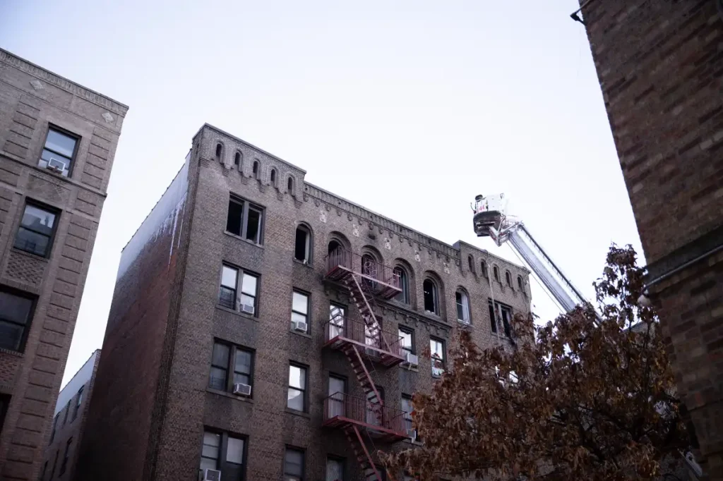 Dead woman found in Bronx apartment fire; nine firefighters and cops injured in blaze