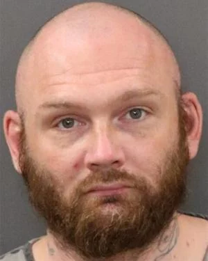 Grand Island man allegedly attacked 23-year-old caregiver, biting her twice with kids in home