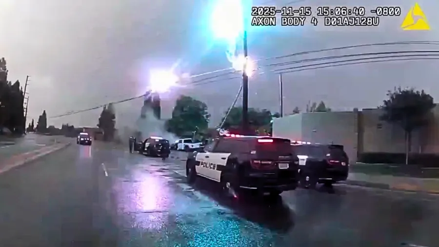Bodycam: Police halt as sparks snap from power pole after Orange County crash