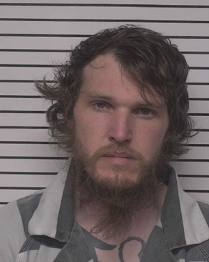 Statesville man charged with possessing stolen backhoe from Mecklenburg County