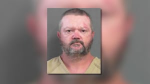 Man accused of burning down house, woman and young child barely escaped