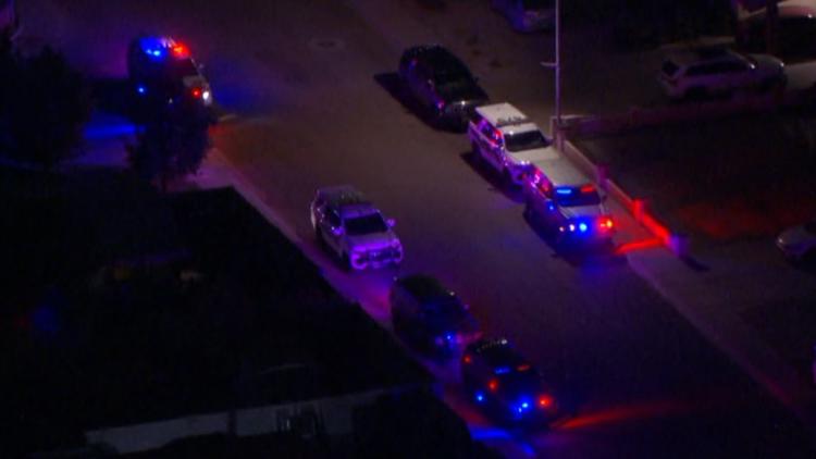 Large police presence in west Phoenix neighborhood, man found with gunshot wound