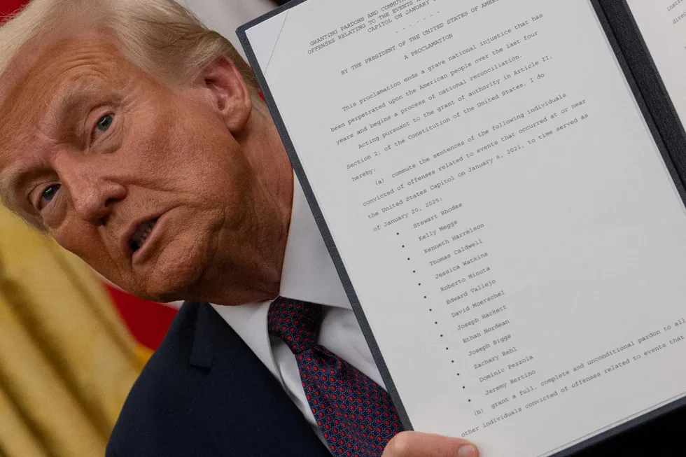 Trump pardons police officer who stalked family on behalf of Chinese government