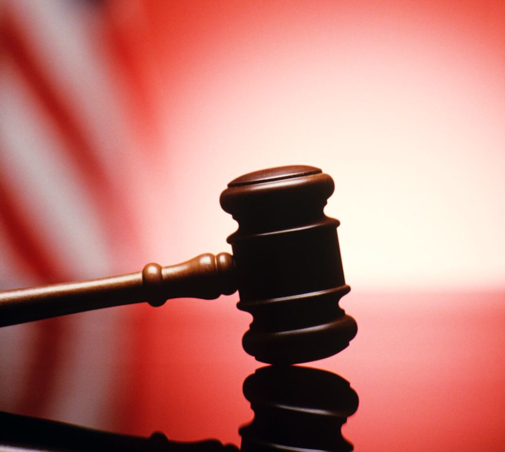 Suspects arraigned in parking deck murder in Traverse City