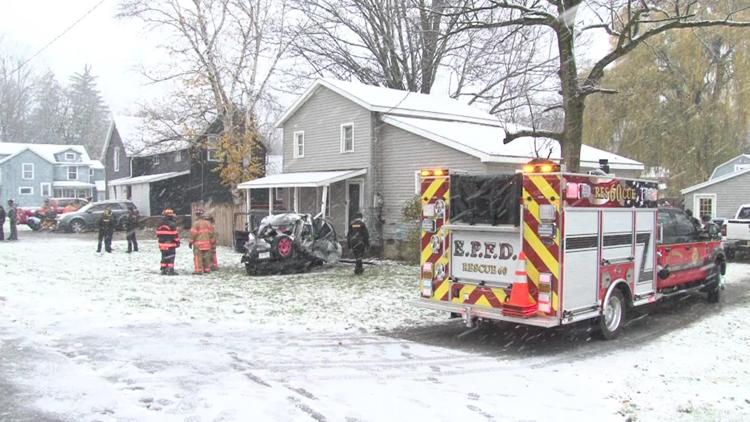 Car crashes into Batavia home after sliding off snowy Route 5