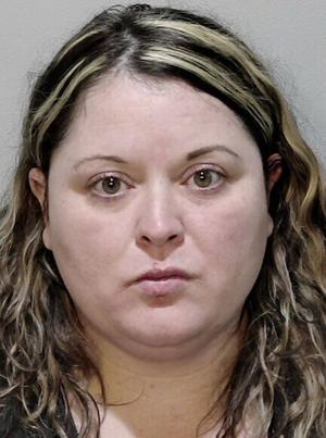 Deputies: Woman threw knife at man’s face