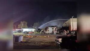 Fire spans across entire city block in Champaign County; Crews to monitor area all night