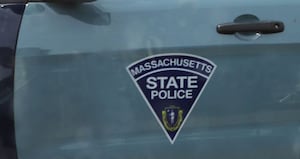 Mass. teen struck 2 workers as he tried to retrieve car towed after arrest, police say
