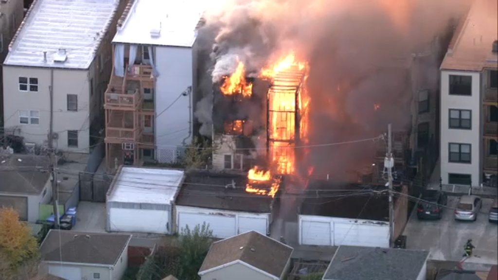 Firefighters battle raging flames at Albany Park building: LIVE