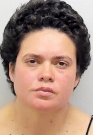 Local woman accused of posting threats