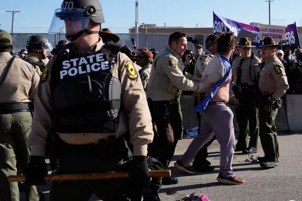 ICE agent ‘grabbed pastor by his throat’ during peaceful protest outside Chicago detention center
