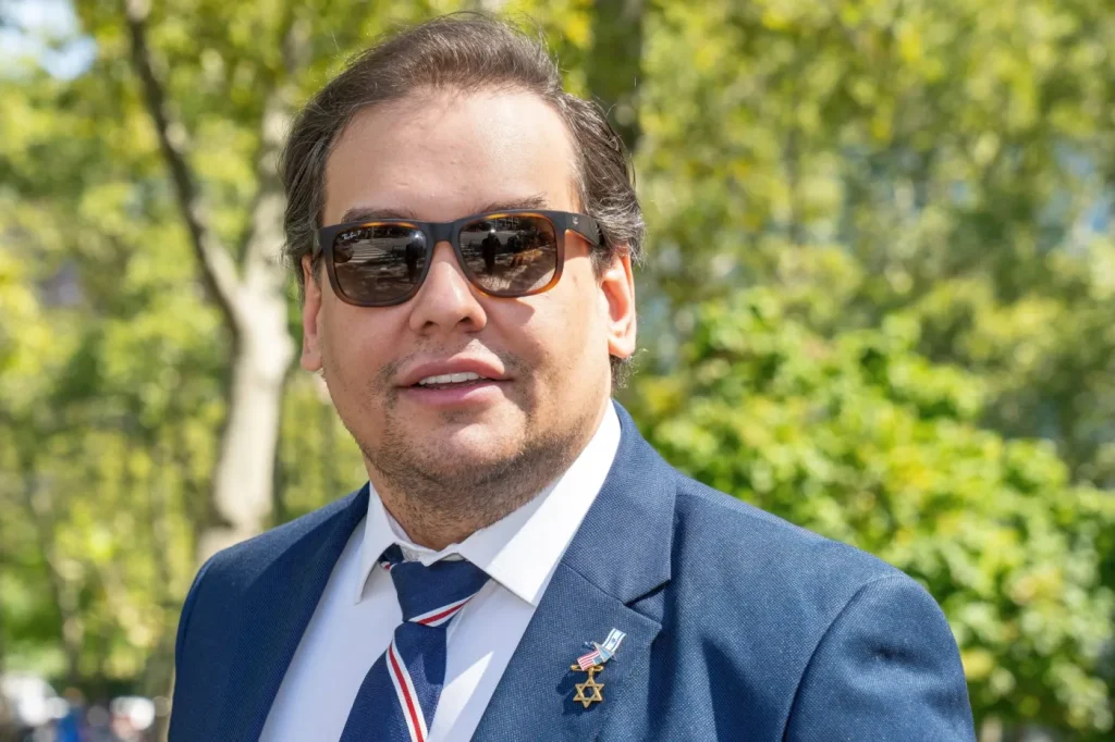 Pardoned former GOP Rep. George Santos reminded on Veterans Day that he was accused of scamming Navy vet