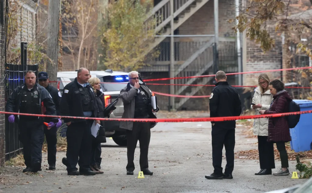 Man shot by police in Washington Park neighborhood charged with felony