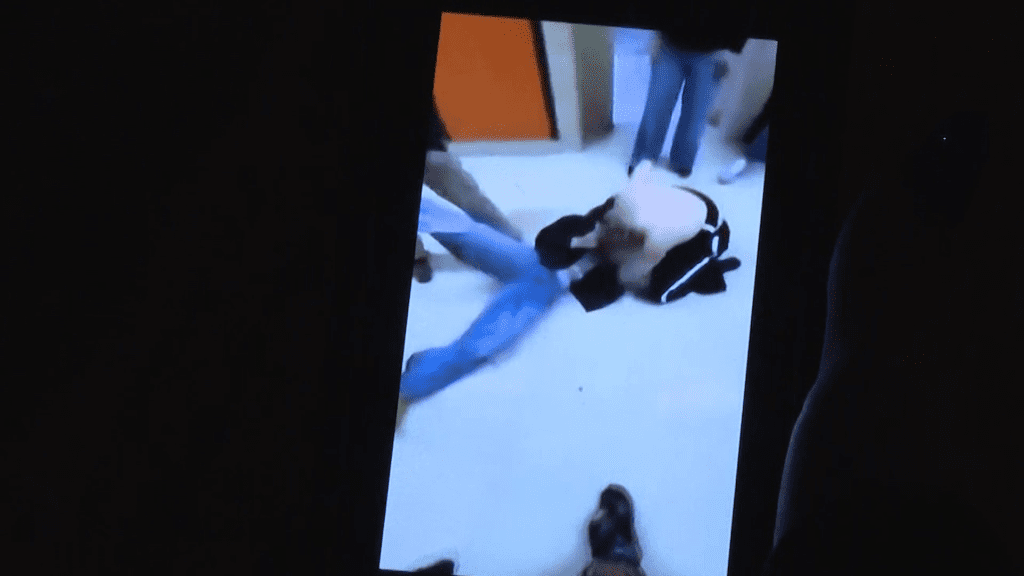 Video shows student swing metal mug during Mass. high school fight