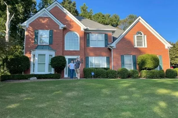 Boy, 2, found soaked in blood and trying to cuddle the bodies of his murdered parents