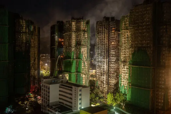 Hong Kong Contractors Used Unsafe Netting at Fire Site, Officials Say