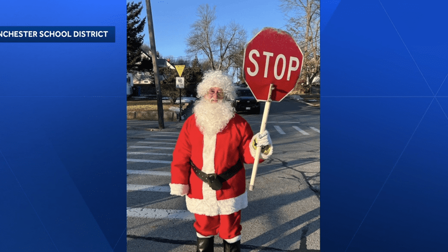 Manchester School District crossing guard gets in the Christmas spirit