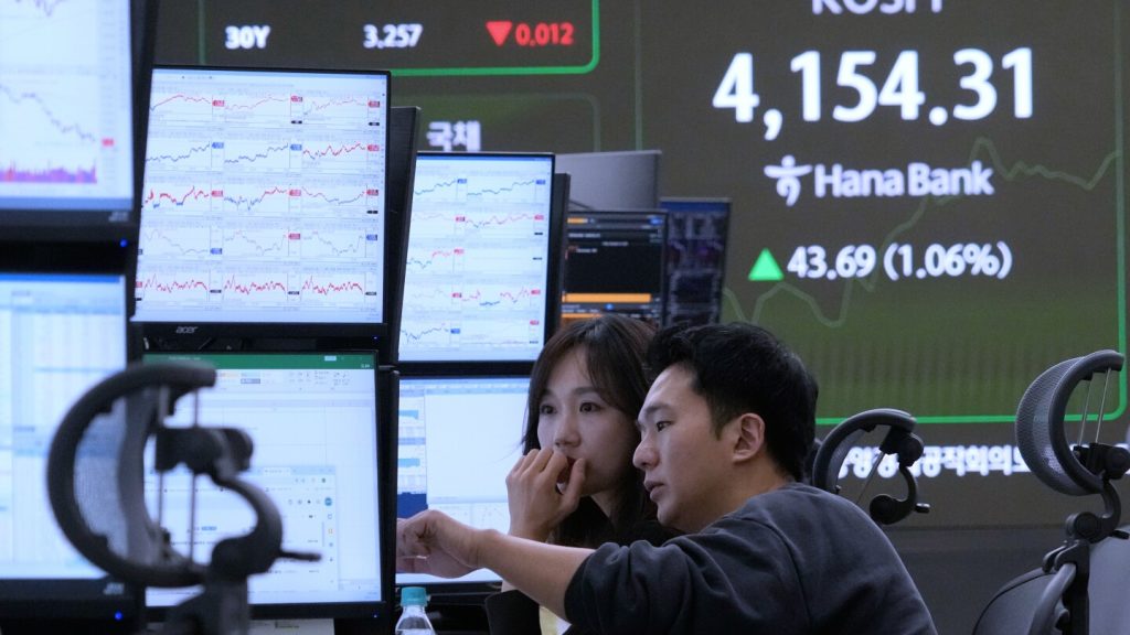 Asian shares track Wall Street’s rise to records despite AI bubble worries