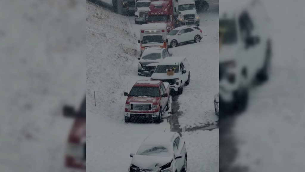 Vehicles scattered across highway after Detroit slammed with snow