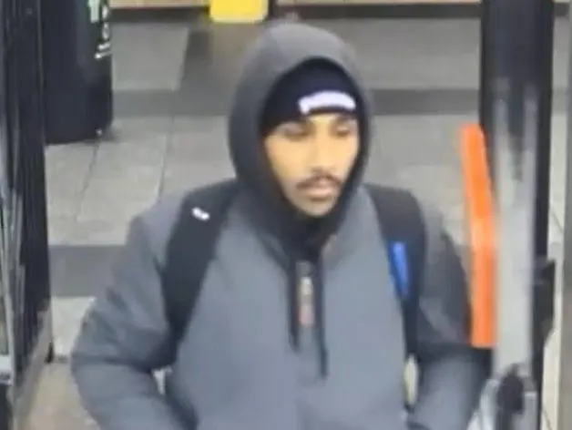 Photo released of suspected arsonist who lit fire to homeless man on subway