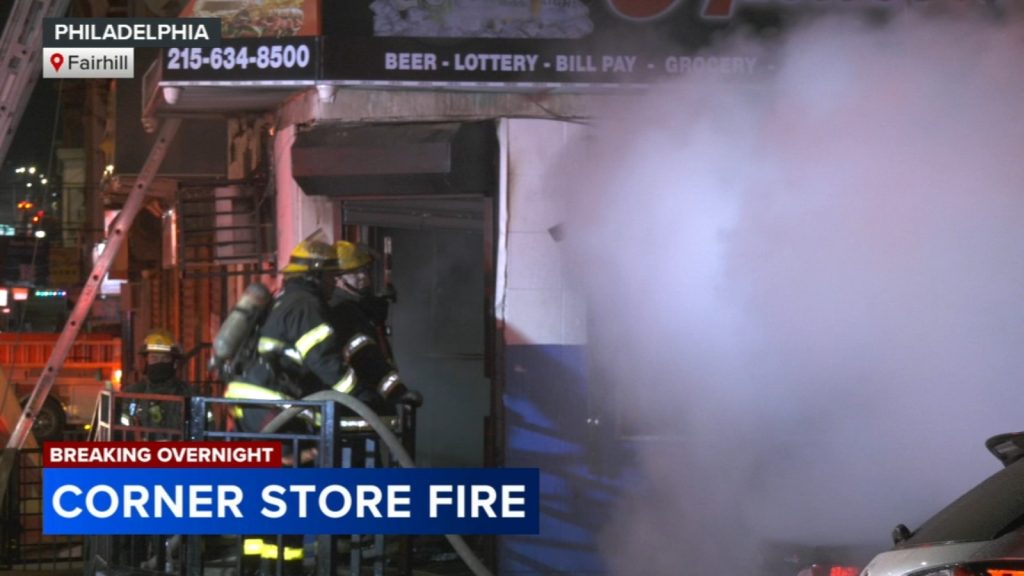 Crews battle flames at corner store in Fairhill