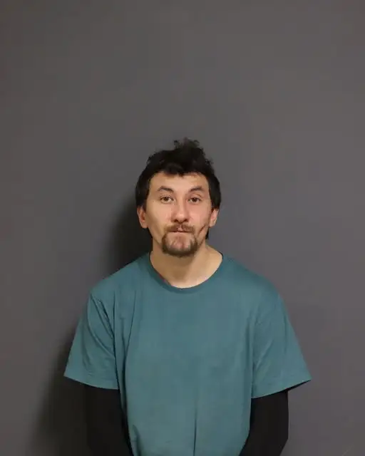 Rome man charged with menacing