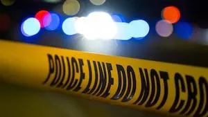 Police searching for suspect accused of shooting a 36-year-old man in front of community center