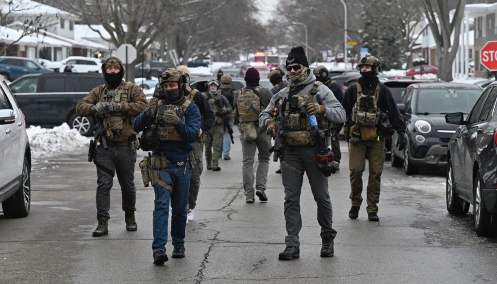 Feds deploy tear gas in Elgin as hourslong standoff ends in man’s arrest