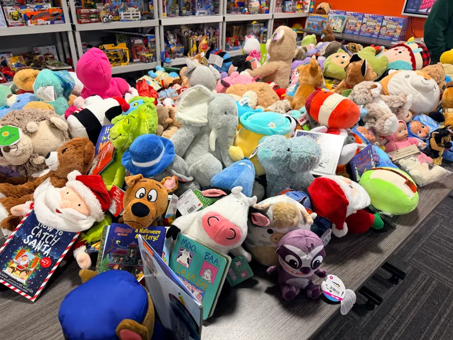 Families ‘shop’ for toys at City Rescue Mission