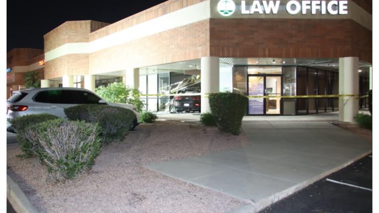13-year-old crashes car into Mesa building, dad arrested, police say