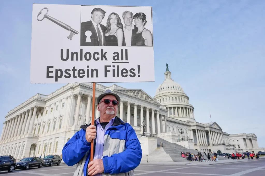 At least 16 Epstein files disappear from DOJ webpage, including photo of Trump