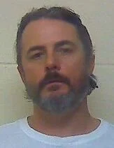 Man charged with embezzling more than $30K from local business