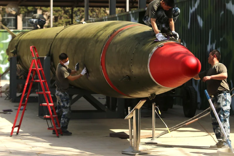 China denies report of 100 ICBMs in border silos, urges U.S. cuts